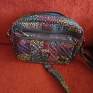 Lug carousel crossbody